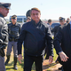 Brazilian President Jair Bolsonaro surrounded by military and security officials.